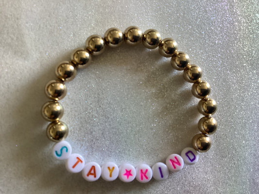 Gold Beaded Bracelet with the words Stay kind